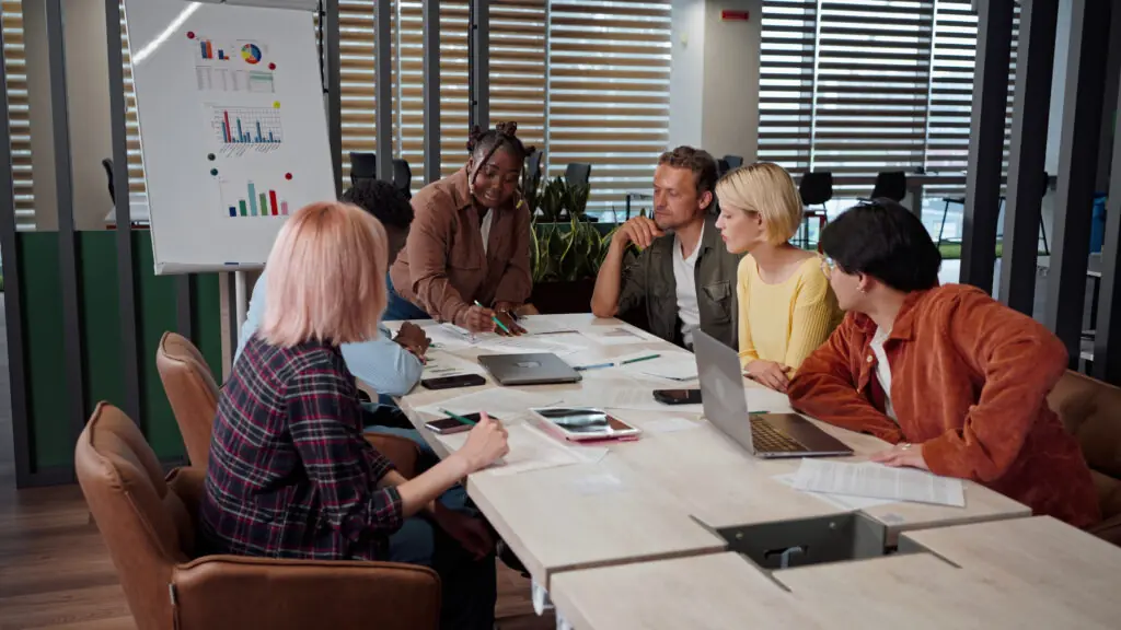 Diverse group of colleagues collaborating during a meeting