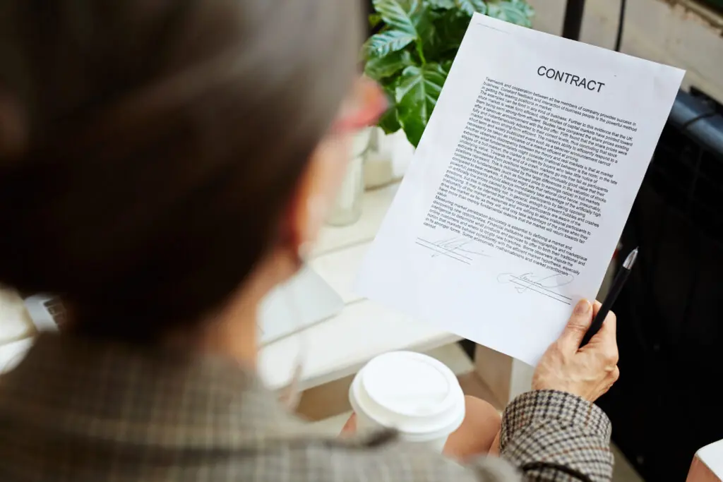 Business professional reviewing a contract document