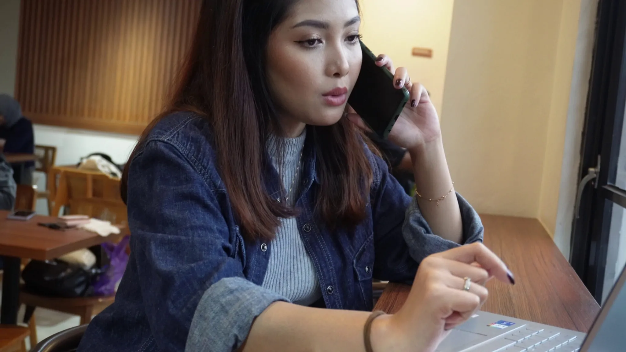 Professional using a headset for on-demand phone interpreting