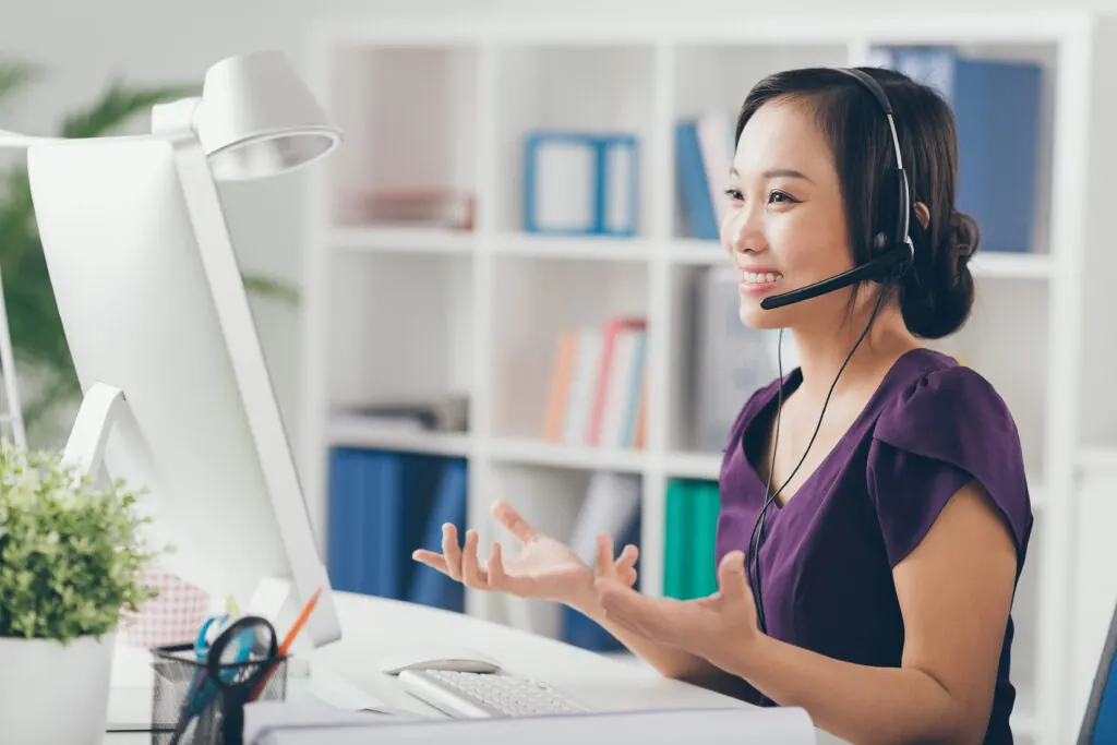 Professional remote interpreter communicating through a headset
