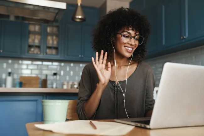 Participants communicating through a live video interpreting session